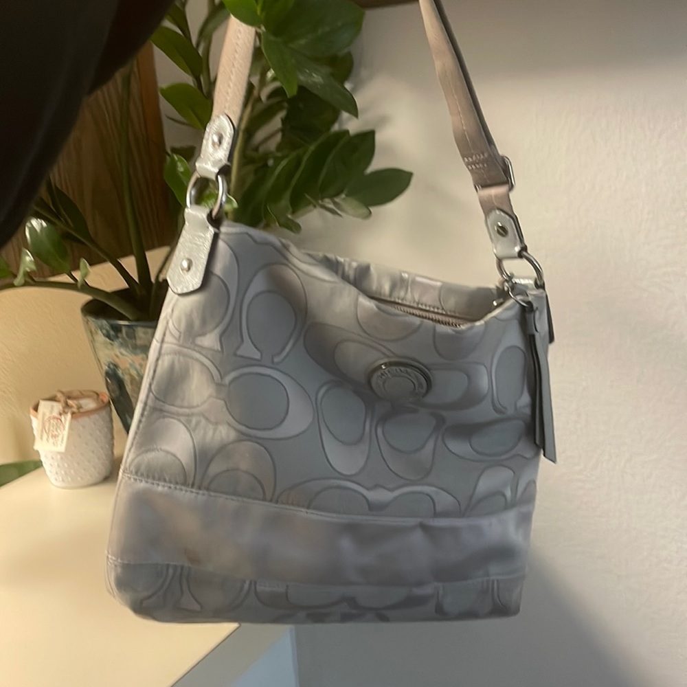 Gray/silver Coach purse